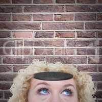 Composite image of close up of pretty blonde woman looking up