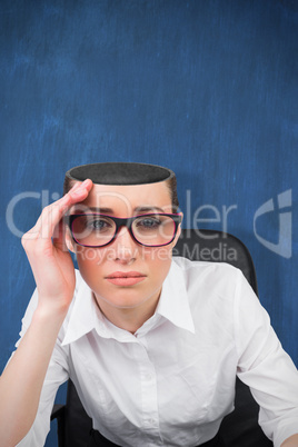 Composite image of thinking businesswoman