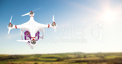 Composite image of a drone bringing a purple cube