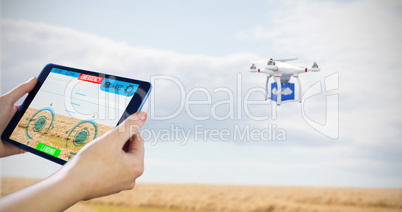 Composite image of hands holding tablet