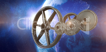 Composite image of metal cogs and wheels connecting