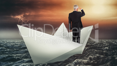 Composite image of rear view of mature businessman looking away
