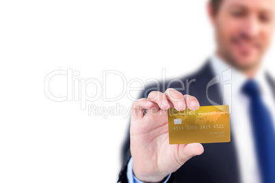 Businessman showing a creditcard