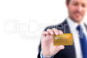 Businessman showing a creditcard