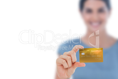 Happy businesswoman showing a creditcard