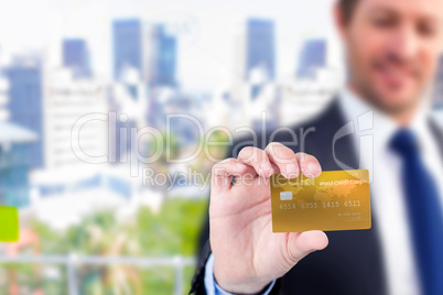 Businessman showing a creditcard