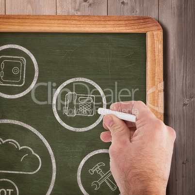 Composite image of business man writing with chalk