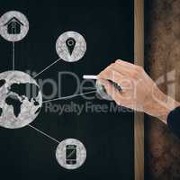 Composite image of hand of a businessman writing with a white chalk