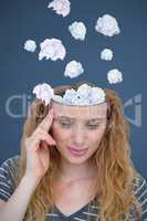 Composite image of blonde woman having headache