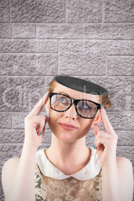 Composite image of hipster redhead looking up thinking