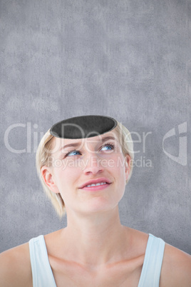 Composite image of thoughtful woman looking up