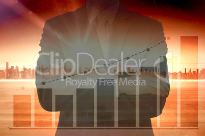 Composite image of midsection of businessman standing arms crossed