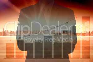 Composite image of midsection of businessman standing arms crossed