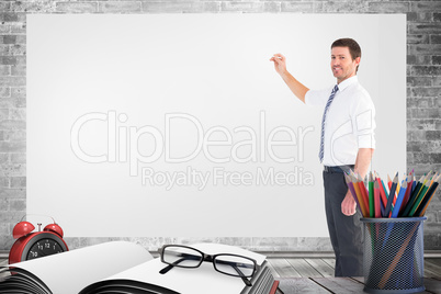 Composite image of businessman standing with his briefcase