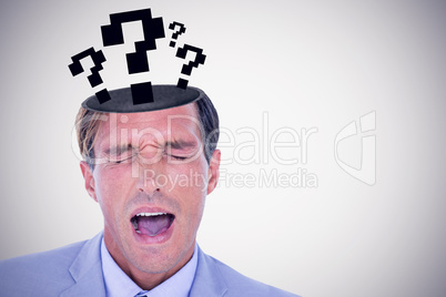 Composite image of  stressed businessman getting a headache