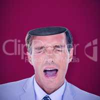 Composite image of  stressed businessman getting a headache