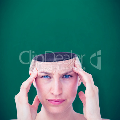 Composite image of pretty blonde suffering from headache looking at camera
