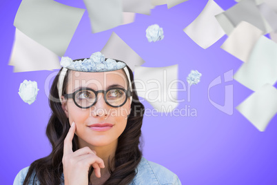 Composite image of thinking brunette