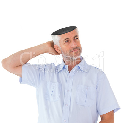 Thinking man posing with hand behind head