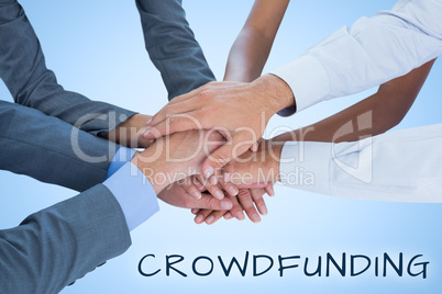 Composite image of business team celebrating a good job