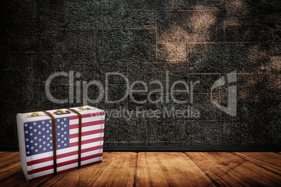 Composite image of american flag on a suitcase