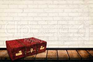 Composite image of wooden suitcase