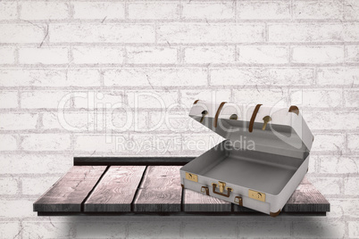 Composite image of open suitcase