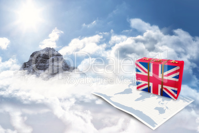 Composite image of great britain flag suitcase