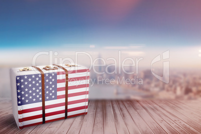 Composite image of american flag on a suitcase