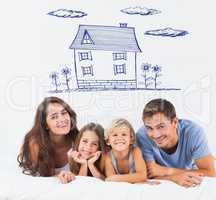 Composite image of happy family lying on a bed