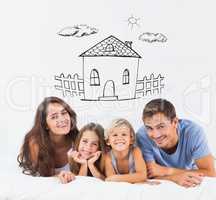 Composite image of happy family lying on a bed
