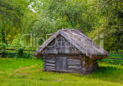 Traditional Ukrainian barn with a straw roof