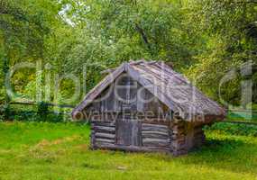 Traditional Ukrainian barn with a straw roof