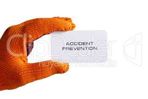 Business card in hand in orange glove
