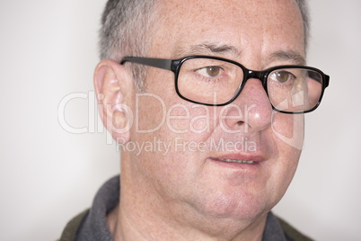 Portrait of a mature man with glasses