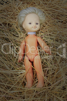 doll lost on the hay