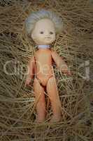 doll lost on the hay