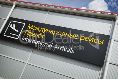 Arrivals area sign in airport