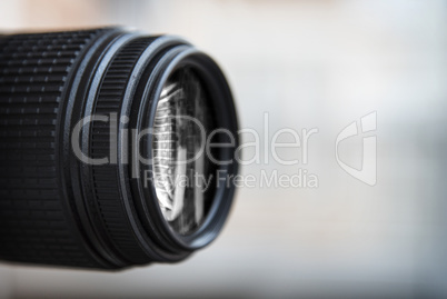 Close-up of a digital camera lens. Large copyspace.