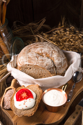 homemade bread with cream and tomato