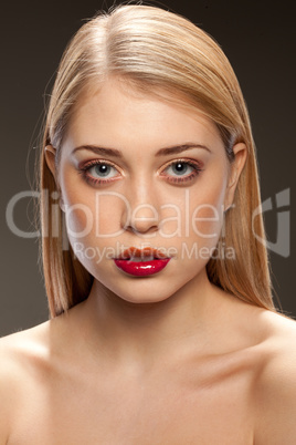 Portrait of beautiful woman with red lips