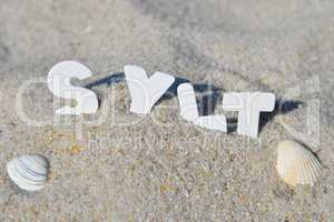 Sylt Wort Buchstaben im Sand