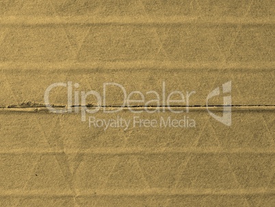 Brown corrugated cardboard background sepia