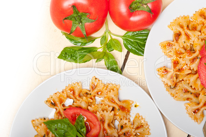 Italian pasta farfalle butterfly bow-tie and tomato sauce