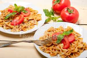 Italian pasta farfalle butterfly bow-tie and tomato sauce