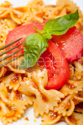 Italian pasta farfalle butterfly bow-tie and tomato sauce