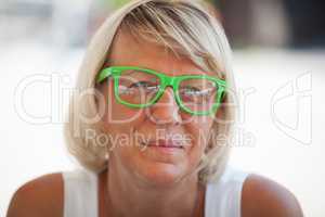 Middle-aged woman wearing trendy eyeglasses