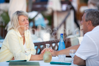 Loving middle-aged couple enjoying a tender moment