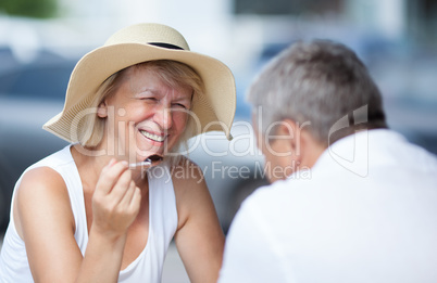 Smiling happy woman relaxing with her husband