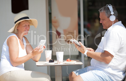 Middle-aged couple relaxing on summer vacation